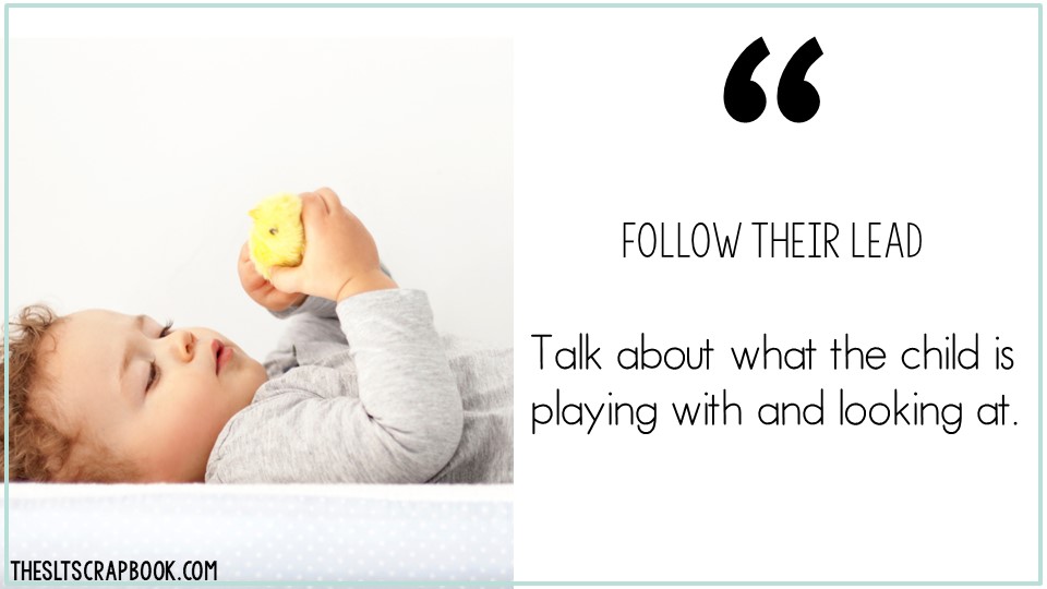 Picture of a young boy laying down looking at a small chick toy. Text reads "Follow their lead- talk about what the child is playing with and looking at" when doing "What's in the bag?" activities.